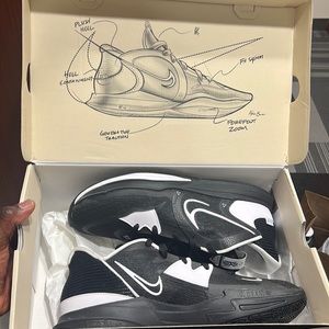 Brand New Nike Kyrie 5 Lows. Never been worn. Still in box.